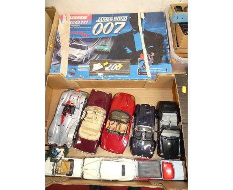 A collection of mixed 1/24 and 1/18 scale modern issue diecast, together with a Carerra Go James Bond 007 slot racing set