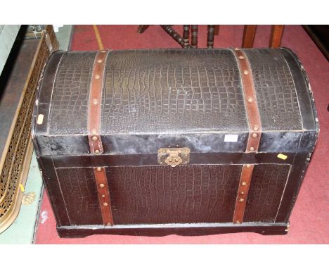 A canvas, leather and studded dome top hinged travelling trunk, width 70cm 