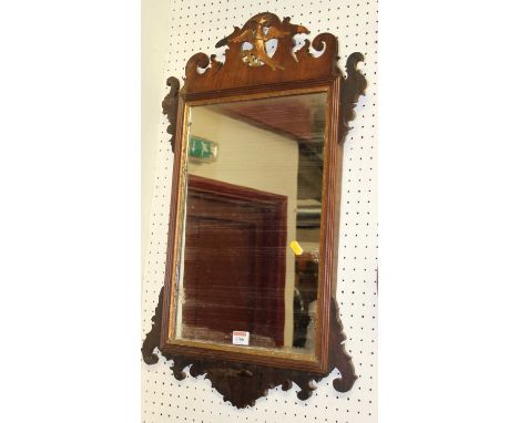 A 19th century faded mahogany fret carved wall mirror in the Chippendale taste (some losses and damages) 71 x 43cm