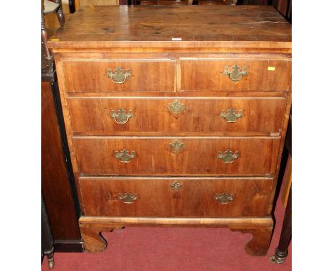 An 18th century walnut chest of two short over three long graduated drawers on bracket supports (split carcas), width 89cm