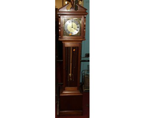 A reproduction mahogany grandmother clock, having glazed trunk door, with pendulum but lacking weights, h.180cm 