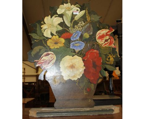 A floral painted shaped fire screen, 65.5 x 52cm