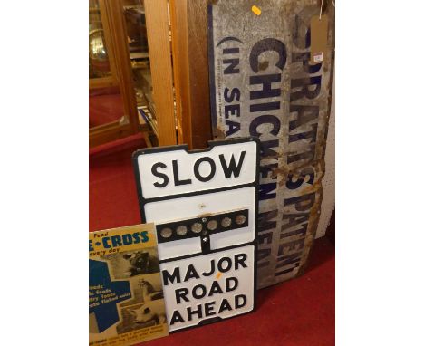 An enamel advertising sign for Spratt's Patent Chicken Meal (in sealed bags only), 38 x 102cm (a/f); together with a cast iro