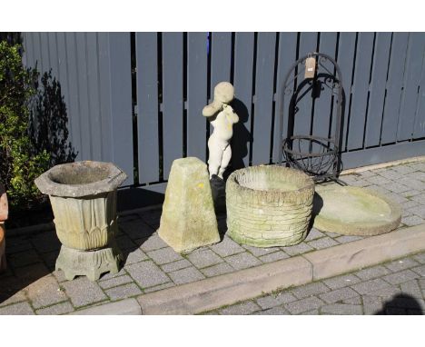 A wrought metal garden planter on stand, together with further reconstituted stone garden items to include two planters, stat