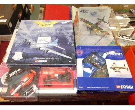 A quantity of mixed 1/43 scale F1 racing diecasts with a quantity of Corgi Aviation model aircraft