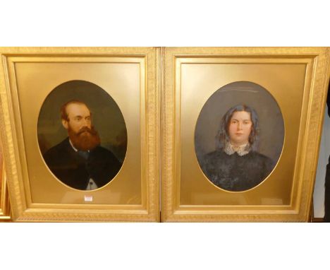 A pair of Victorian portrait studies, being overpainted prints, each framed as an oval, 44 x 35cm 