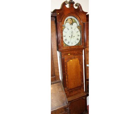 An early 19th century oak and mahogany crossbanded longcase clock, having an arched repainted moonphase dial, twin winding ho