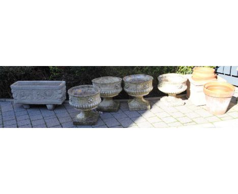 Four reconstituted stone pedestal circular garden planters, each dia.38cm; together with a trough planter; and a collection o