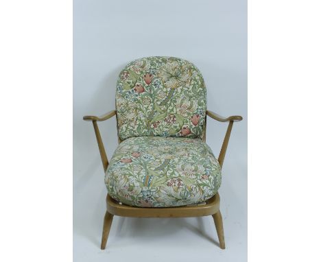 An Ercol beech and elm armchair
