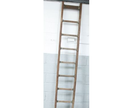A vintage pine wooden ladder