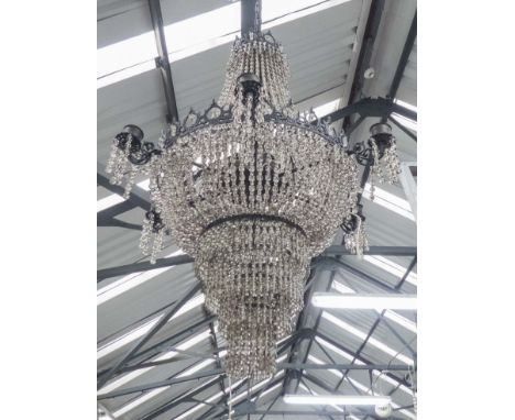 CHANDELIER, the circular decorative cast metal frame with six sconces and multiple droplets, 86cm W.