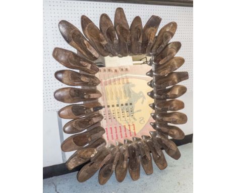 MIRROR, with shoe last surround, 114cm x 95cm.
