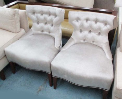 EASY CHAIRS, a pair, silk button back in cream fabric on square supports, 61cm W. (2)