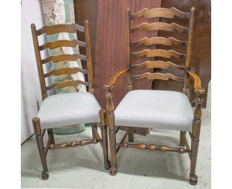 DINING CHAIRS, a set of eight, Georgian style oak including two armchairs with ladder backs. (8)