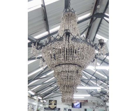 CHANDELIER, the circular decorative cast metal frame with six sconces and multiple droplets, 86cm W.
