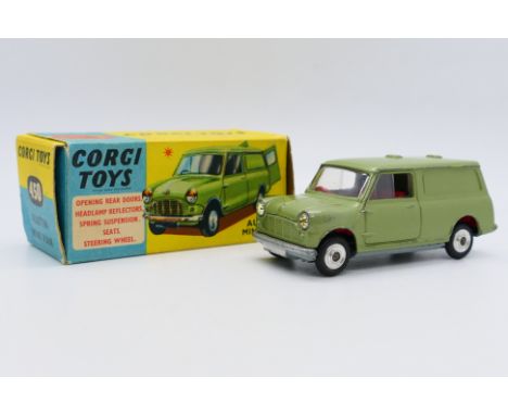 Corgi - A boxed Austin Mini Van in metallic green # 450. The model appears in Very Good condition with some light wear. The b