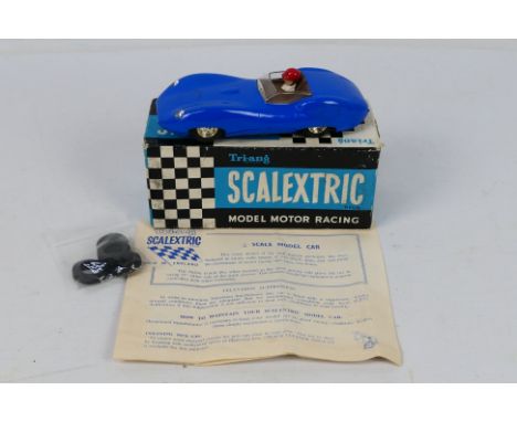 Scalextric - A boxed Lister Jaguar racing car in blue # MM/C.56. The model appears in Very Good condition with light signs of