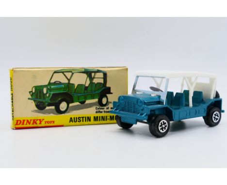 Dinky - A boxed late model Austin Mini-Moke in metallic green with Speedwheels # 342. The model appears in Mint condition in 