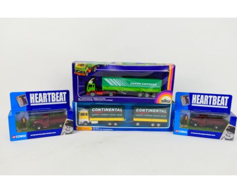 Corgi - Matchbox - Siku - Four boxed diecast model trucks. Lot consists of Corgi CC07301 'Heartbeat' Morris Commercial Truck 