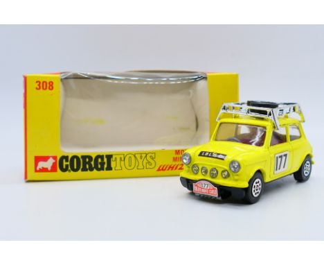 Corgi - A boxed Monte-Carlo Mini Cooper S with whizzwheels in yellow racing number 177 # 308. The model appears Near Mint wit