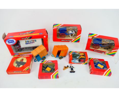 Britains - A collection of mainly boxed diecast vehicles from Britains. Lot includes #9420 Farm Tractor; #9499 Tumbrel Cart (
