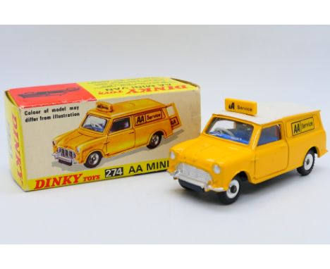 Dinky - A boxed AA Mini Van in yellow with a white roof # 274. The model appears in Very Good condition with a few minor mark