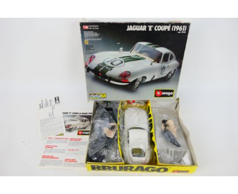 Bburago - A boxed Jaguar E Type Coupe model kit in 1:18 scale # 7018. The kit appears untouched and Very Good with parts seal