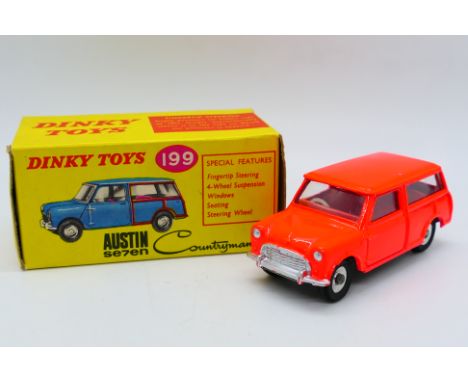 Dinky - A boxed Austin Se7en Countryman in fluorescent orange # 199. The model appears Near Mint with just a couple of paint 