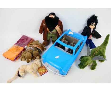 Harry Potter - A collection of Harry Potter merchandise to include: Weasley's flying car - Ford Anglia, Norbert, Mrs Norris (