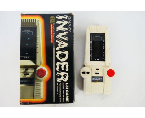 CGL - Vintage Galaxy Invader - A boxed 1970s Galaxy Invader Handheld Interactive Game. Item appears to be in Excellent condit