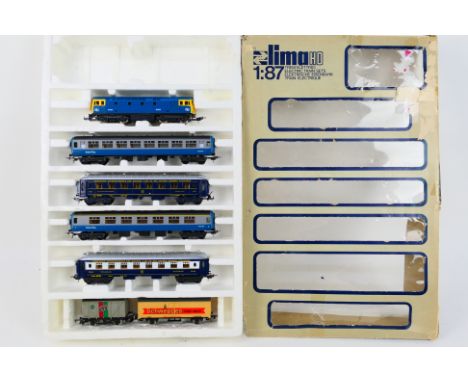 Lima - A boxed HO gauge part train set with a Class 33 Diesel locomotive, 4 x coaches and 2 x wagons. The items appear in Goo