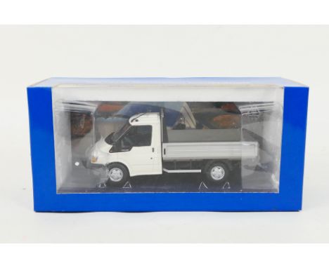 Paul's Model Art / Minichamps - A boxed diecast 1:43 scale Ford Transit Chassis Float by Paul's Model Art. The dealer issued 