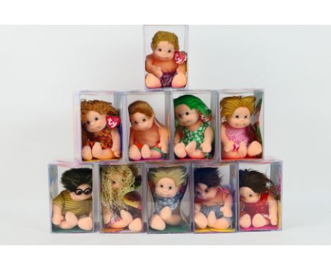 TY Beanie Kids, Display cases - 10 Beanie Kids in display containers, all are impressed with TY on the lid. Includes: "Prince