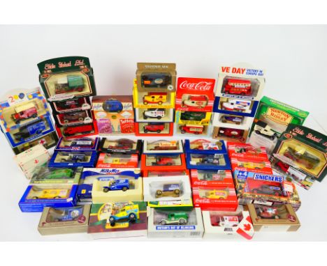 Diecast - A collection of assorted boxed diecast model cars (Approx 50). Predominately lledo, some Corgi . Mostly advertising