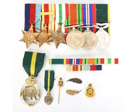 A group of 6 Second World War Service medals, including the Africa Star with Eighth Army bar, together with ribbons and 1955 