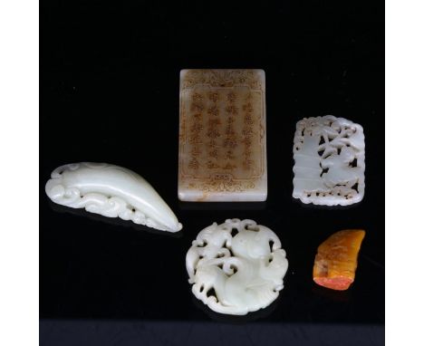 A Chinese Shoushan artist's seal, a carved jade tablet with calligraphy, a carved jade roundel and jade fruit (5) 