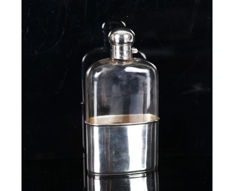 An Edwardian silver and glass spirit flask with removeable cup base, by Mappin & Webb, hallmarks London 1902, height 16cmGood