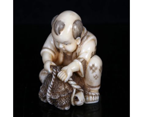 A Japanese ivory netsuke, tortoise catcher, signed, height 4cmGood condition 