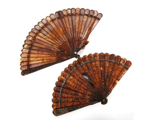 2 early 19th century Chinese tortoiseshell brise fans, length 22cm and 18.5cm (2) (A/F)Both fans have 1 end panel missing and