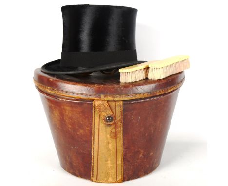 MANDER & ALLENDERS - a Vintage black silk top hat, in a Victorian brown leather hatbox 