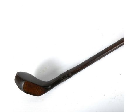 A Victorian golfing Sunday walking stick with brass-mounted headGood original condition, slight wear through normal use 