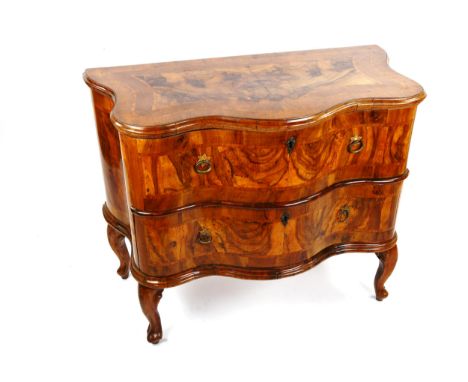 An 18th century French walnut serpentine-front 2-drawer commode, on cabriole legs, width 102cm, depth at centre 53cm, height 