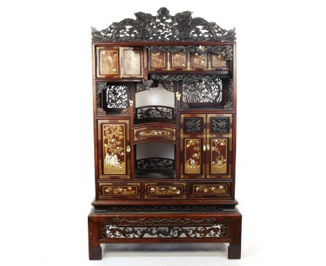 A superb quality Japanese Shibayama cabinet, Meiji Period circa late 19th century, the carved and pierced pediment depicting 