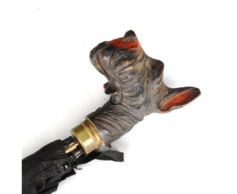 A Vintage telescopic folding walking stick/umbrella, with carved and painted wood Terrier head handle with opening mouth 