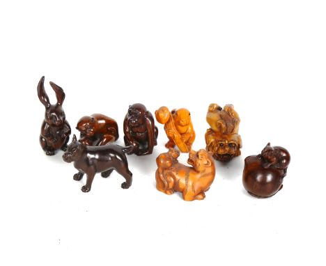 A collection of Japanese carved wood netsuke (8) 