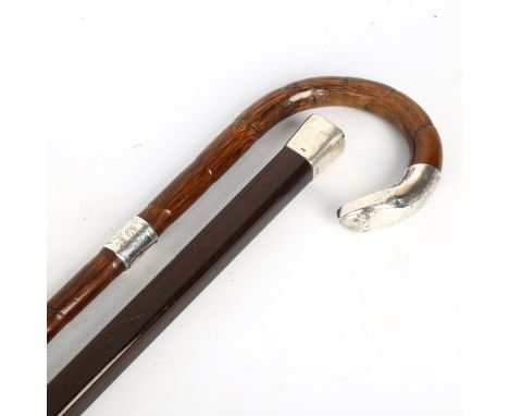 2 silver-mounted walking canes, 1 by Bencox London 1907, and another monogramed WH (2)Silver mounts have very light dents, ge