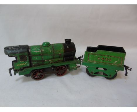 Vintage die cast clockwork train engine and tender