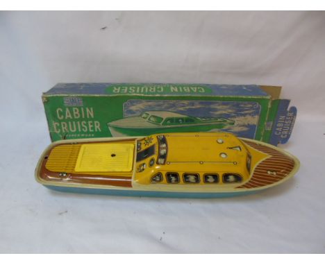 Boxed vintage tin plate cabin cruiser