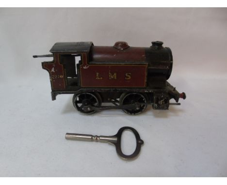 Vintage clockwork train engine with key