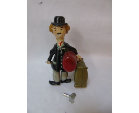 Vintage Clockwork Charlie Chaplin figure with key